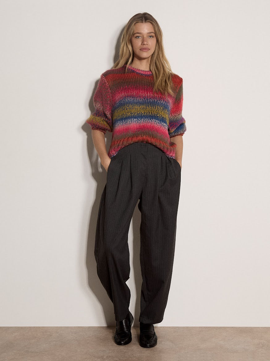 Chunky knit multicolor striped jumper in pink, blue, and yellow tones