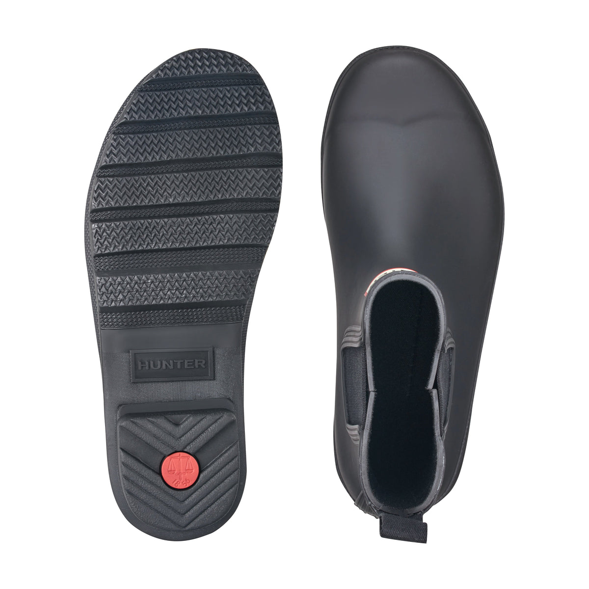 Hunter Chelsea rain bootie shown from above and sole view with elastic side panel
