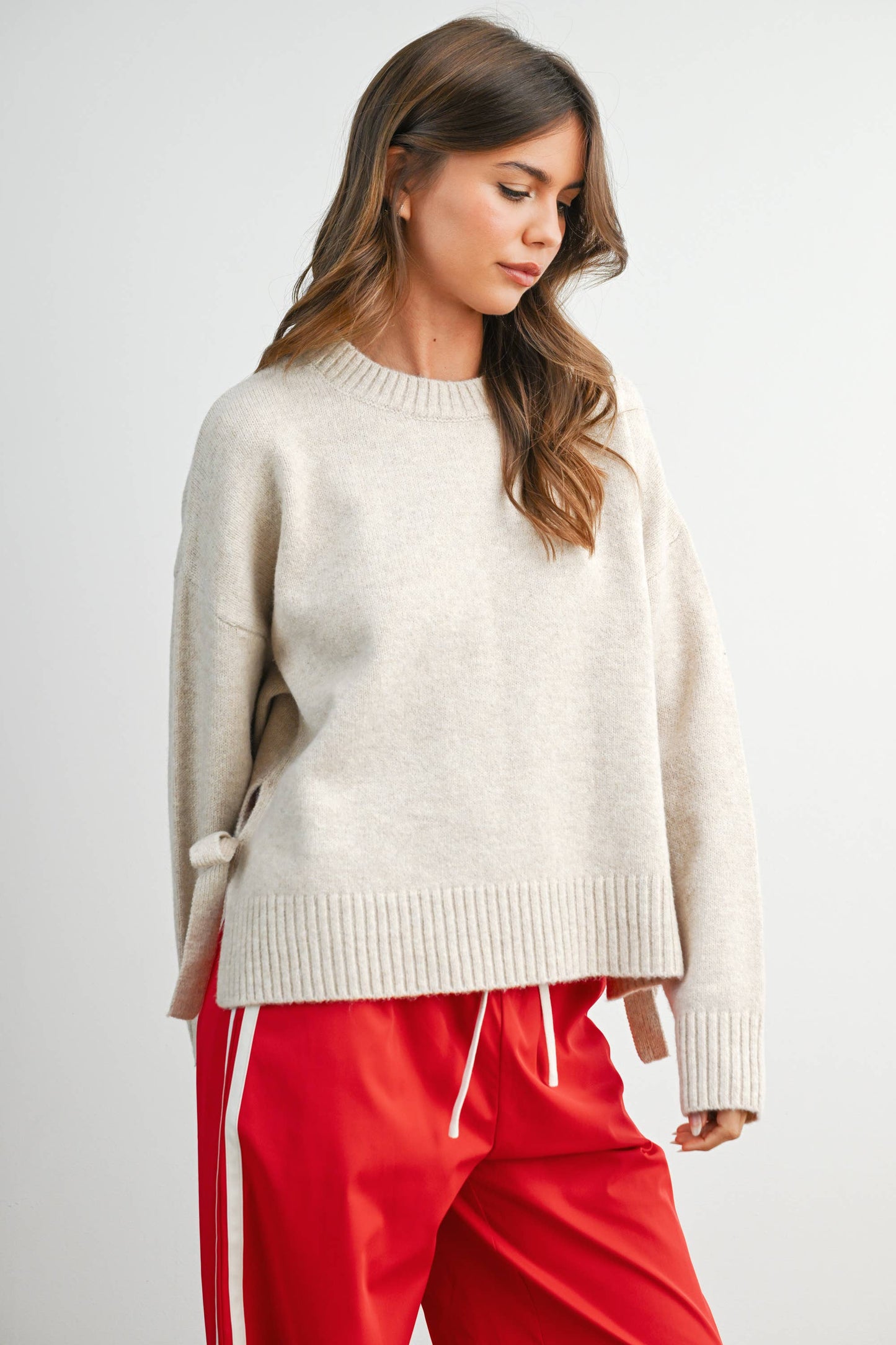 Buttermelon Tie Split-Hem Crewneck Long Sleeve Top