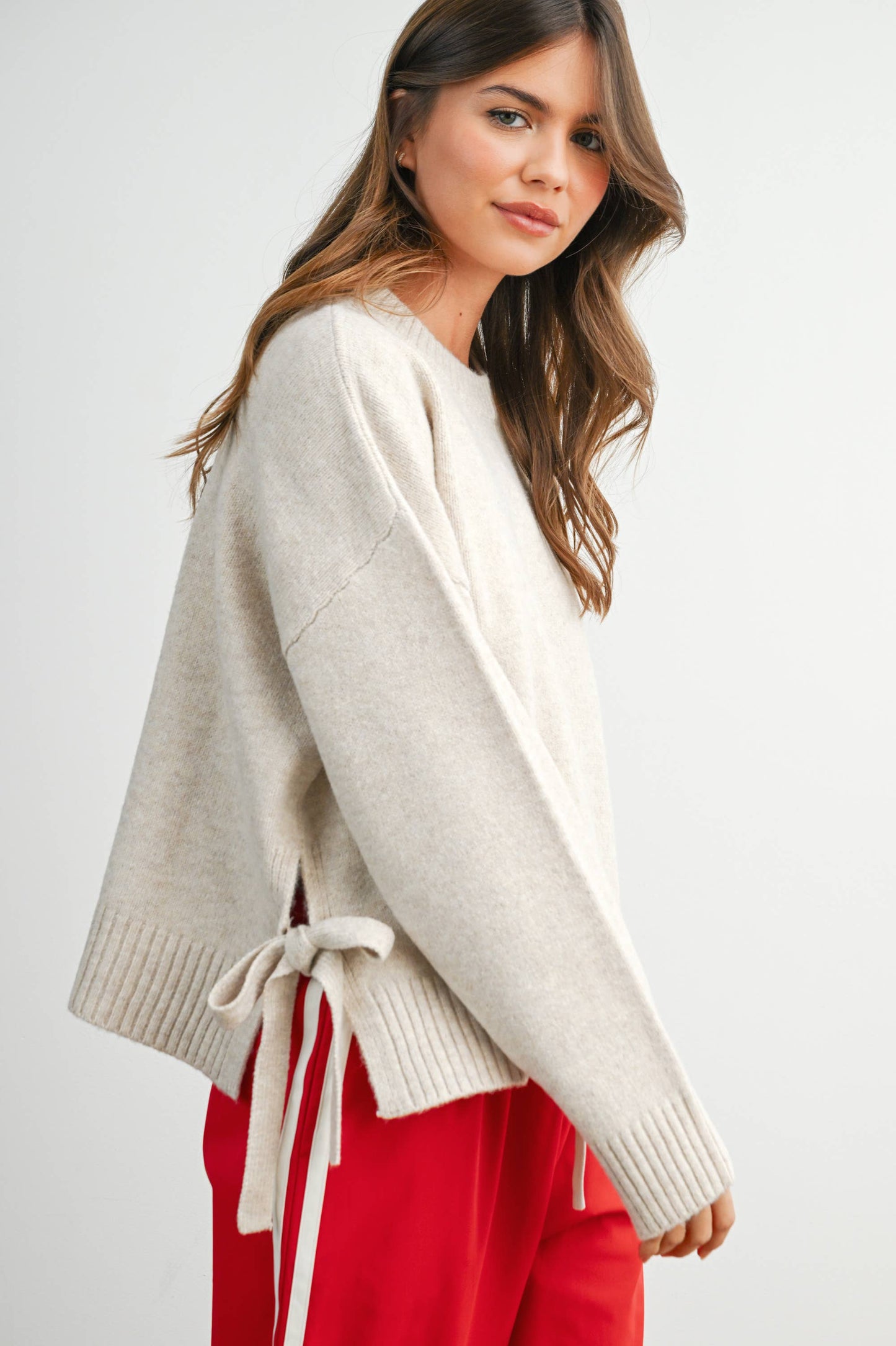 Buttermelon Tie Split-Hem Crewneck Long Sleeve Top