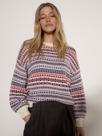 Multicolour Fair Isle knit jumper with red, blue, and cream geometric pattern