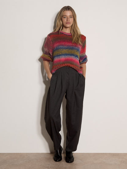 Chunky knit multicolor striped jumper in pink, blue, and yellow tones