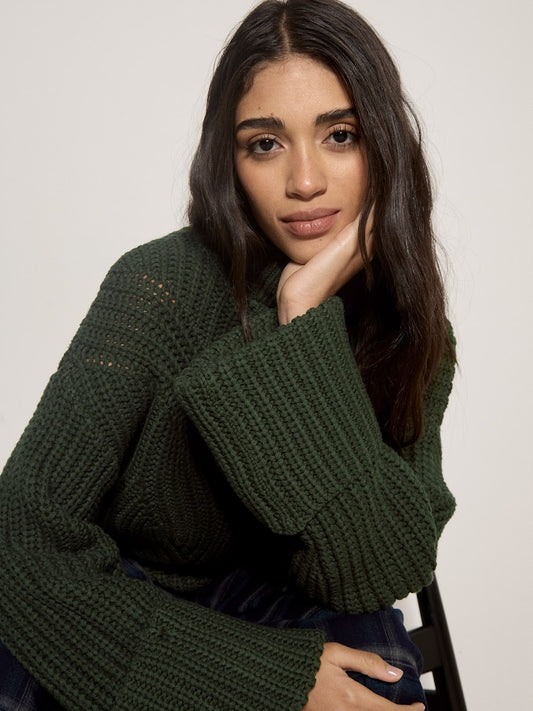 Forest green chunky cable knit high neck jumper with wide ribbed cuffs