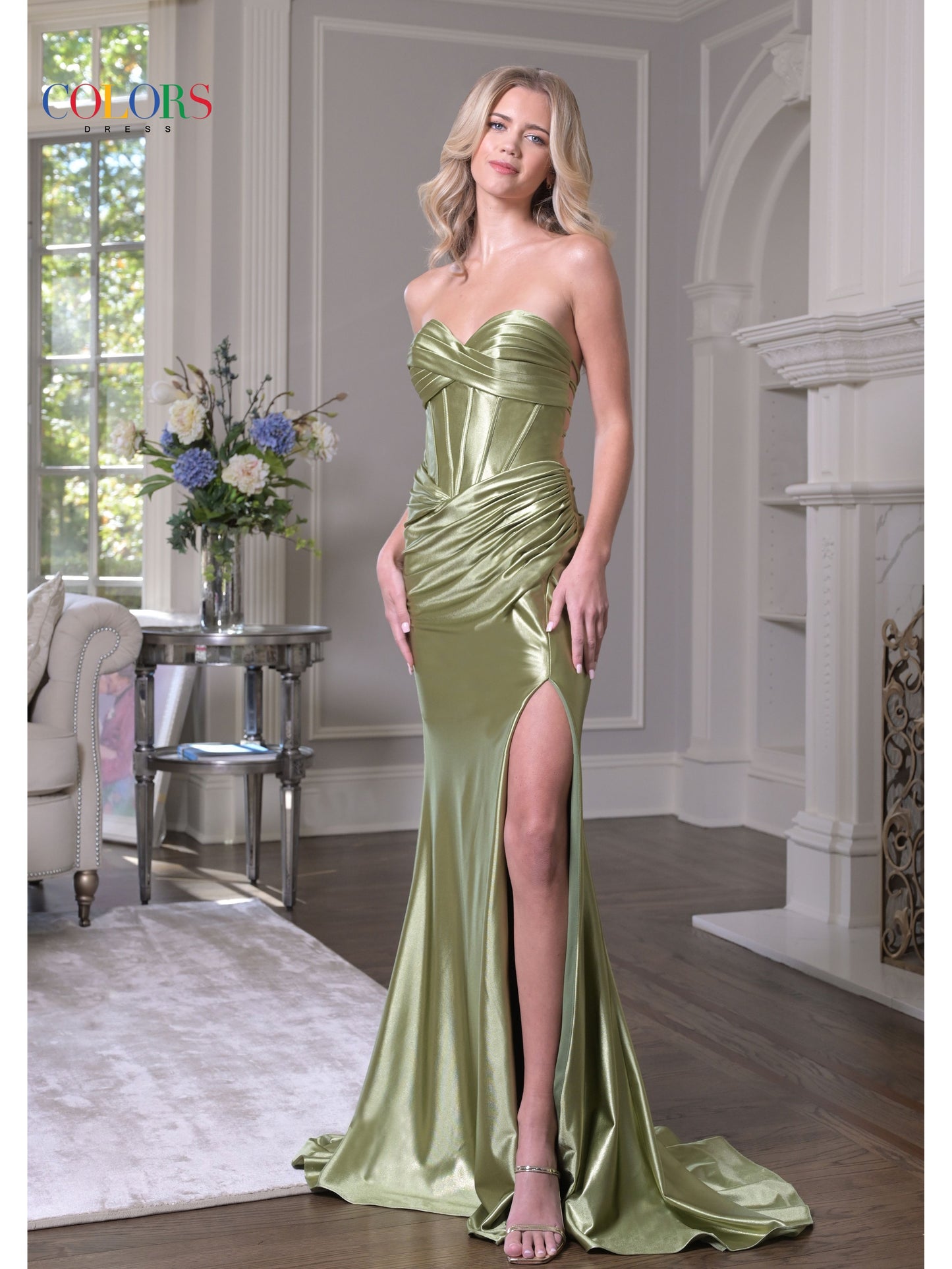 Colors strapless corset fitted gown with a ruched skirt and thigh slit