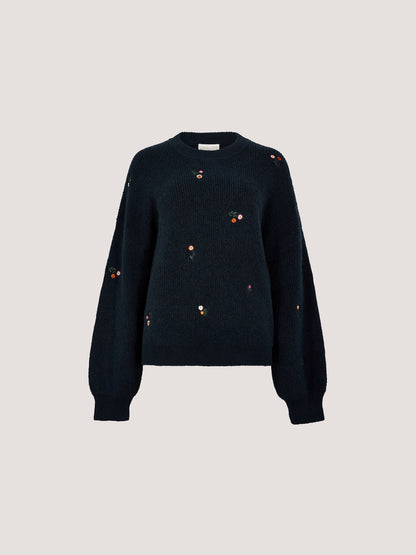 Relaxed navy knit jumper with scattered small embroidered floral motifs and balloon sleeves