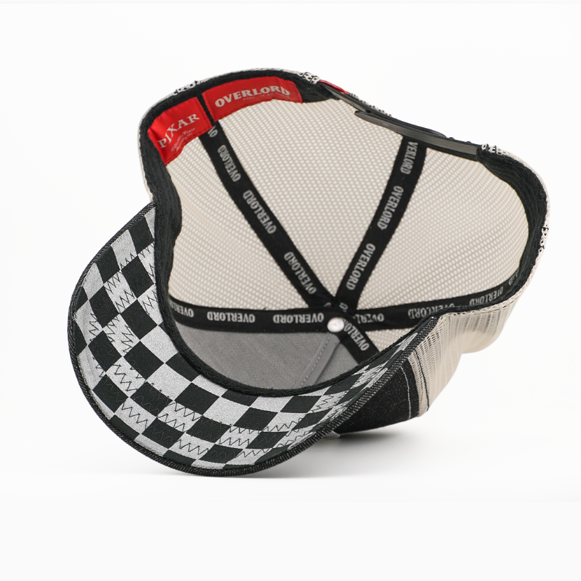 Interior view of Overlord x Pixar Cars Sheriff snapback cap showing checkered brim lining and mesh crown